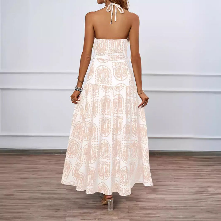 Women's maxi dress with fine graphic print and adjustable halter neck Chic & Stil