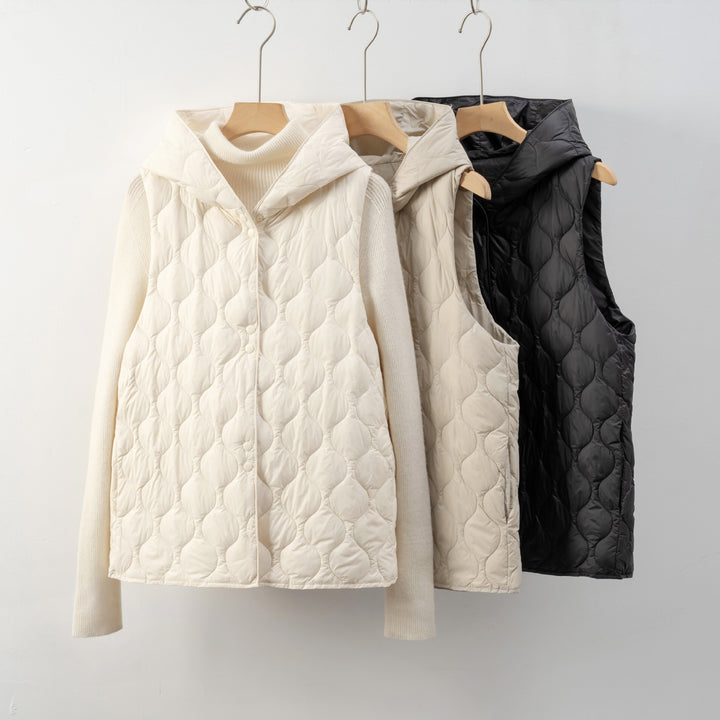 Ladies padded vests with hidden hood and soft inner lining Amarae