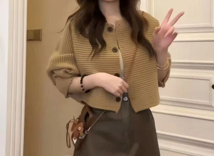 Fashion knitted jacket for women with button detail and structured design Lune London