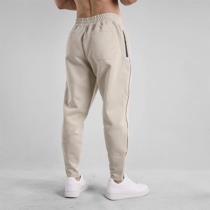 Sporty jogging pants for men with elastic waistband and side zip pockets Lune London