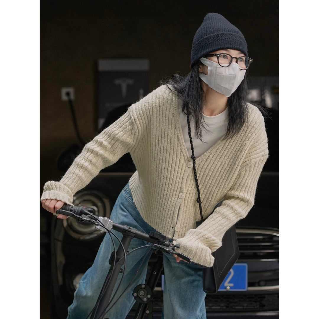 Women's Knitted V-Neck Cardigan in a distinctive ribbed pattern with short length and casual sleeves Amarae