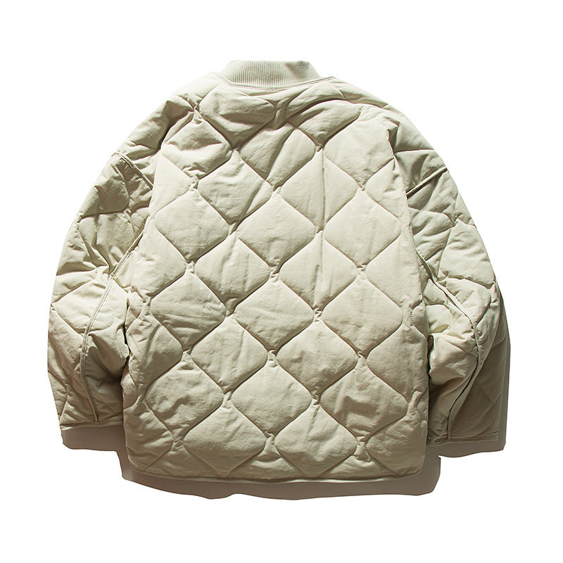 Unisex Lightweight Boxy Puffer Jacket with distinctive diamond quilting, front round pockets, and ribbed collar Amarae