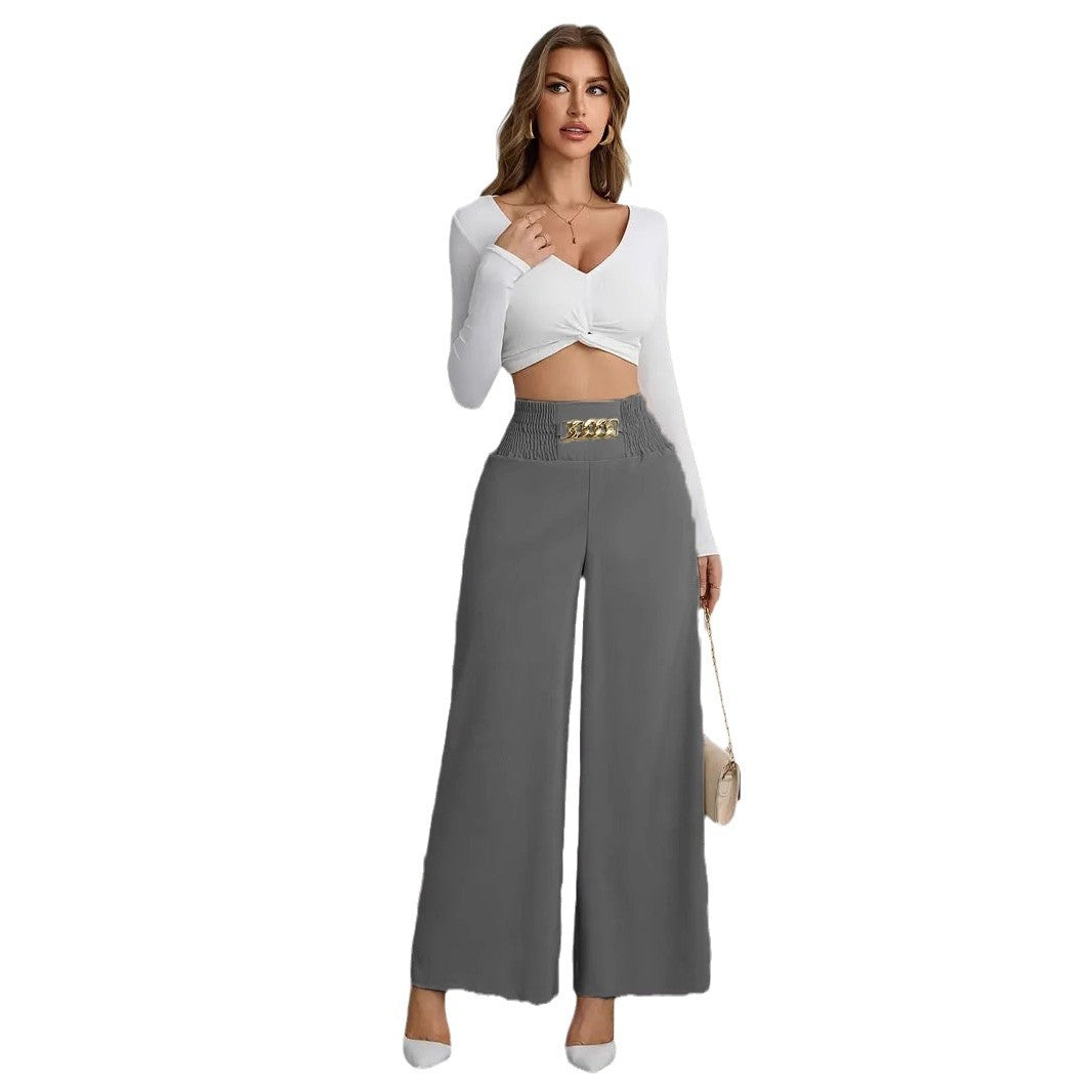 Wide palazzo trousers for women with elastic waistband and decorative belt Lune London