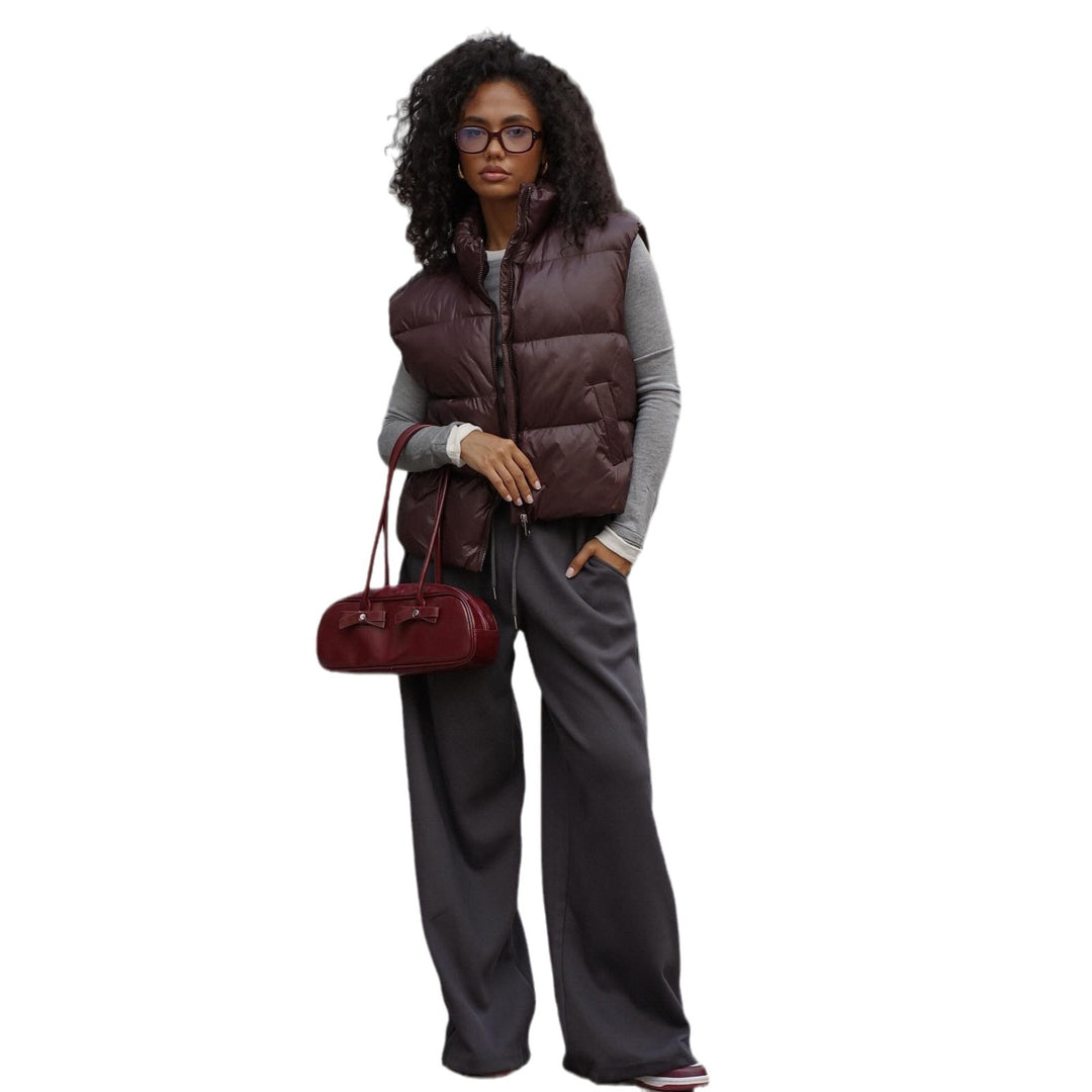 Quilted women's vest with high collar and practical zipper Amarae