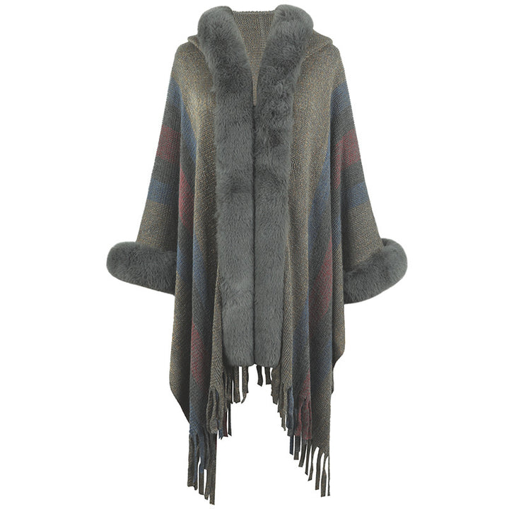 Women fashionable poncho with luxurious faux fur collar and fringes Lune London
