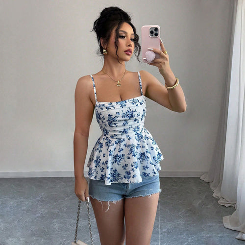 Elegant women's blouse with floral design and peplum cut Chic & Stil