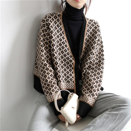 Femme cardigan élégant avec motif géométrique et détails de boutons Chic & Stil