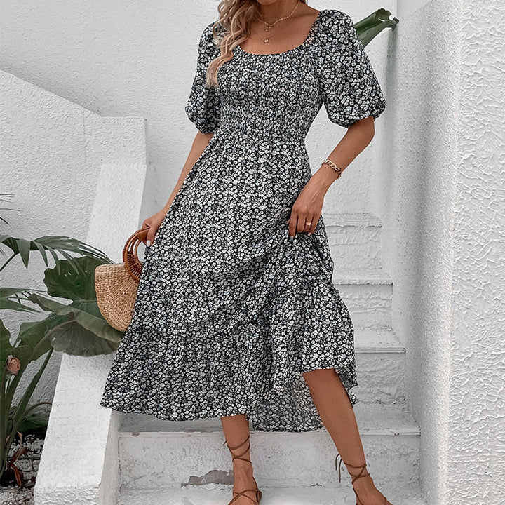 Maxi dress for women with floral print and crossed back detail Lune London