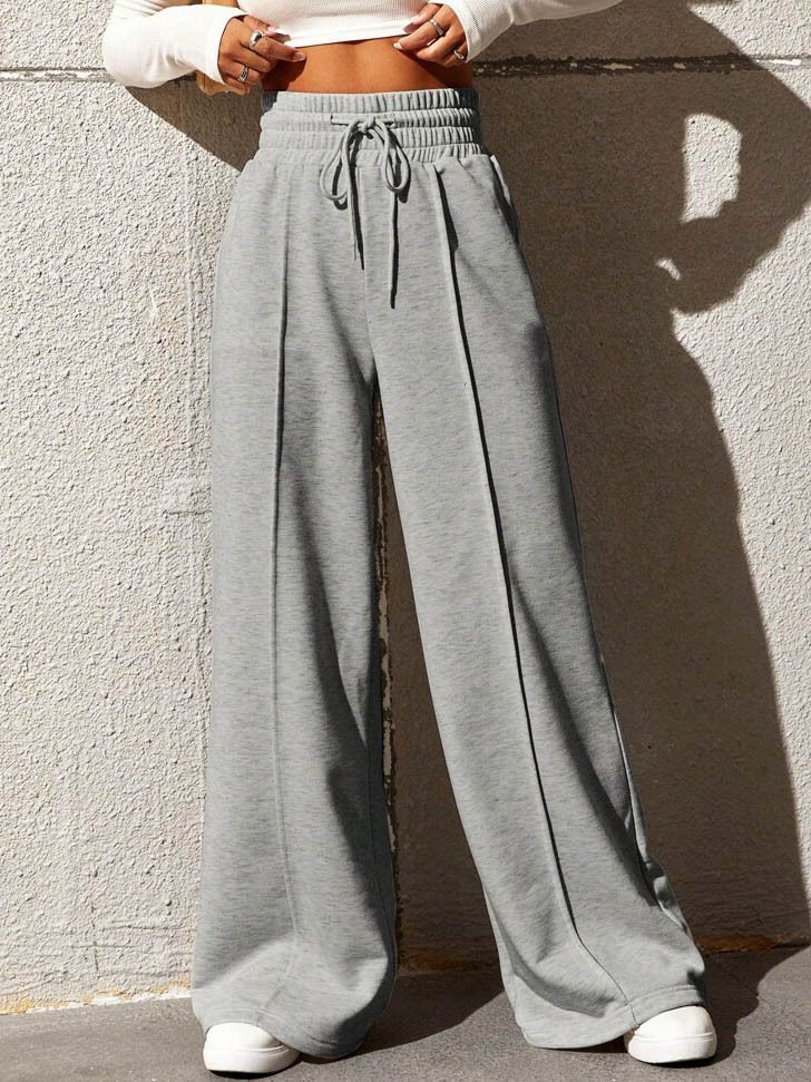 Wide sports pants for women with elastic waistband and side pockets Lune London
