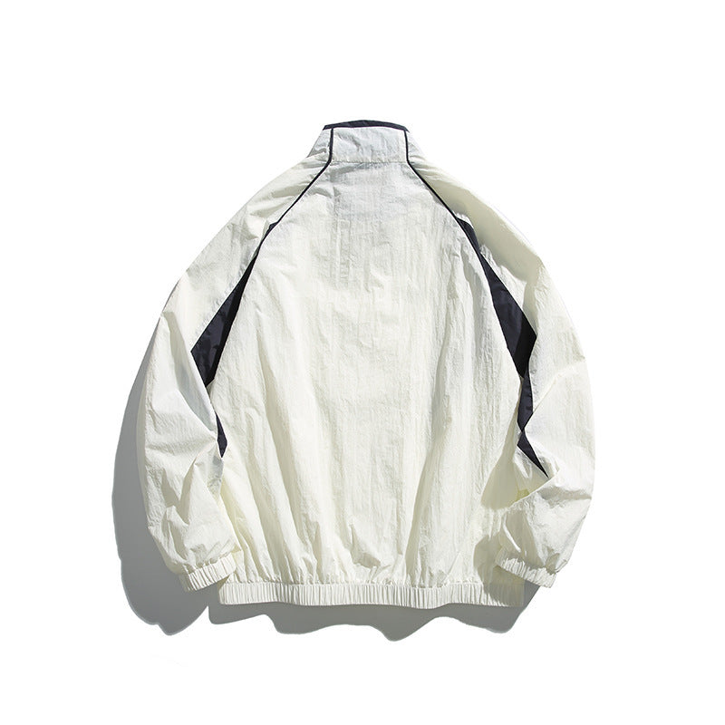 Unisex Lightweight Boxy Hooded Jacket in Windbreaker Style with Contrast Panels and Raglan Sleeves Amarae
