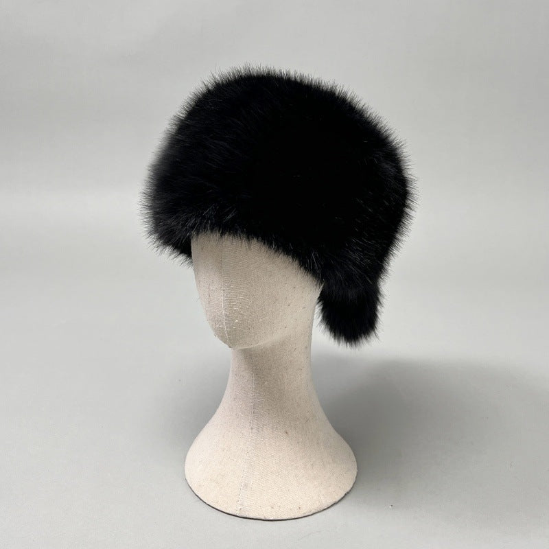Women’s plush faux fur trapper hat with earflaps and decorative tail Amarae