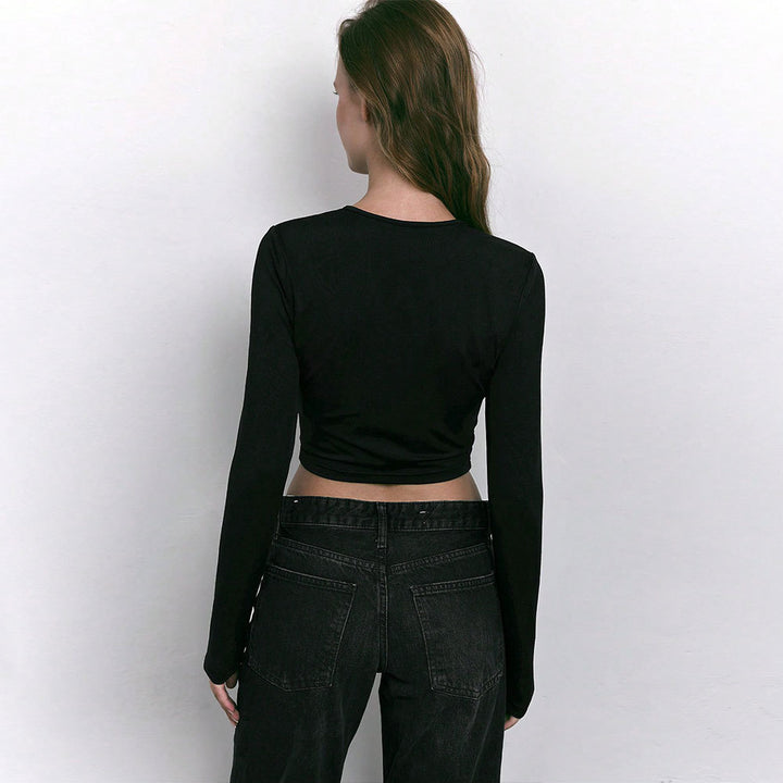 Chemise femme à manches longues cropped avec des découpes tendance et des détails de bague décoratifs Chic & Stil