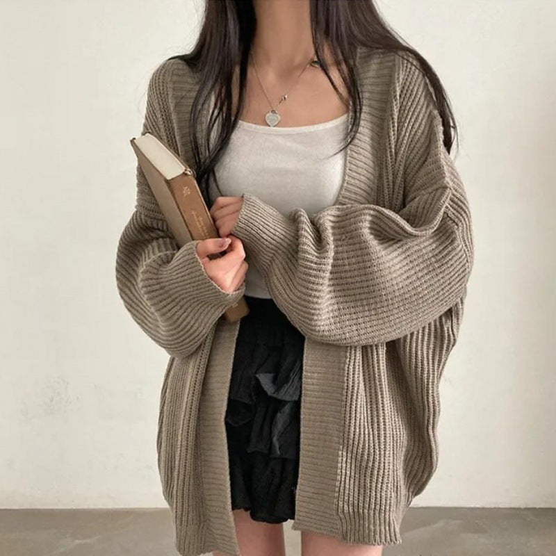 Plus size knitted jacket for women with wide sleeves and a structured texture Lune London