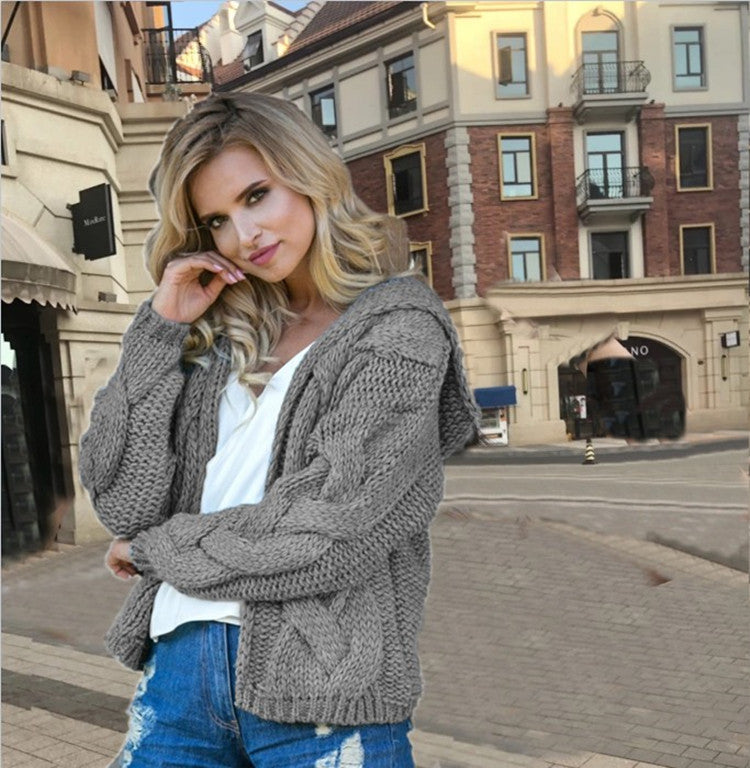 Women's knitted jacket with hood and modern braiding pattern Lune London