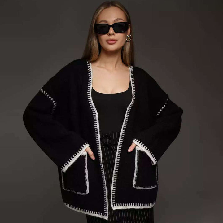 Comfortable knitted cardigan for women with a deep V-neck and practical pockets Lune London