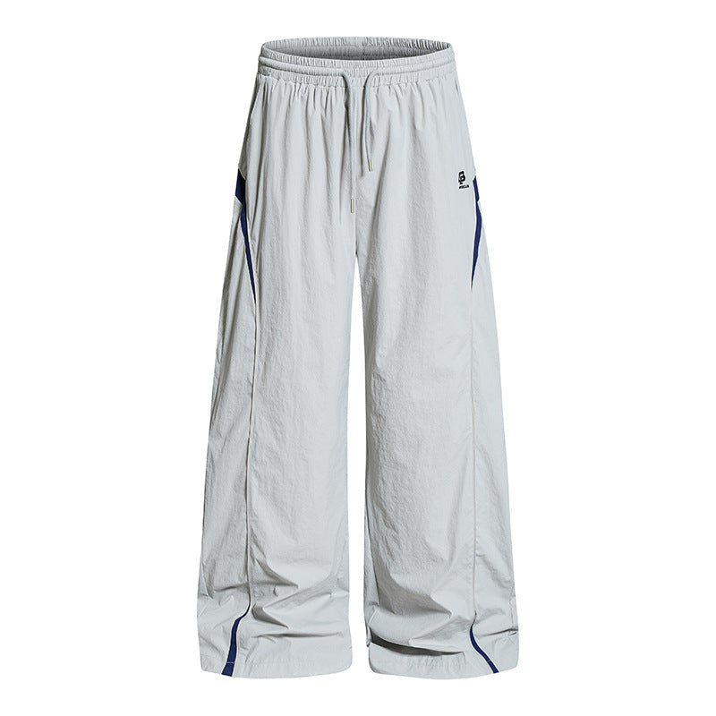 Women Wide Nylon Palazzo Training Pants with Drawstring, Side Contrast Triangles and Adjustable Hem Amarae