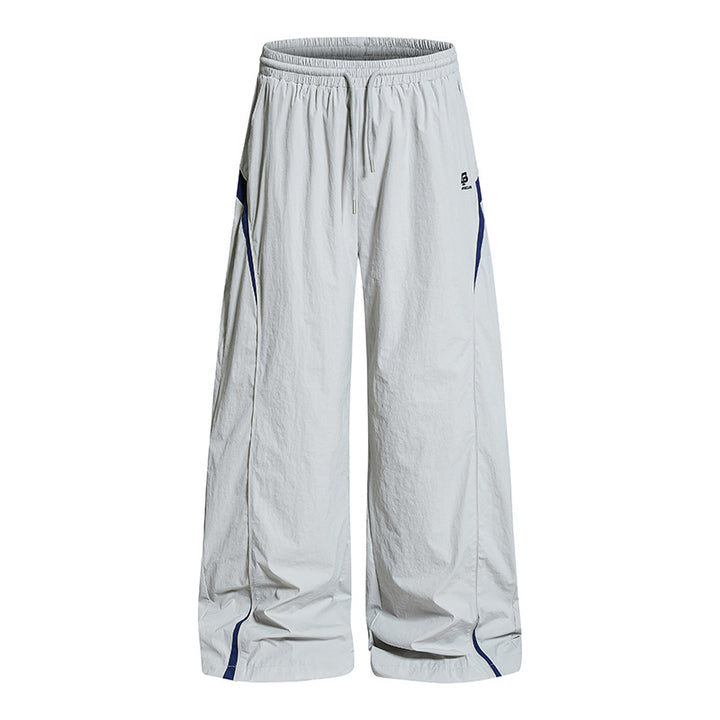 Women Wide Nylon Palazzo Training Pants with Drawstring, Side Contrast Triangles and Adjustable Hem Amarae