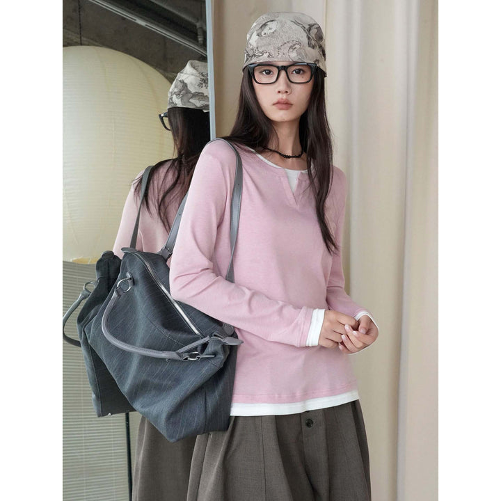 Women layered look long sleeve with notch at the neckline made of soft sweat fabric