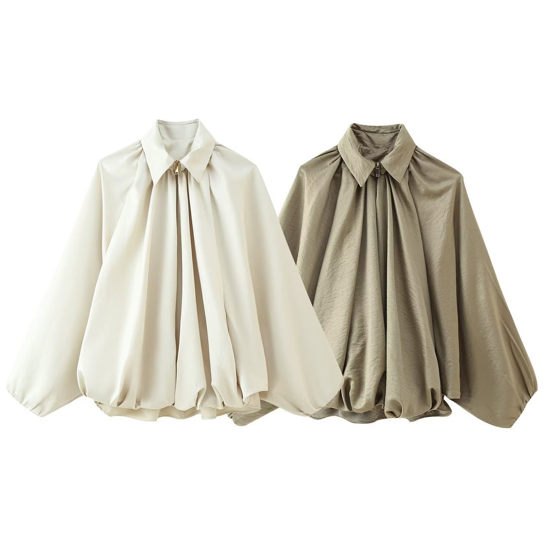 Blouse élégante pour femmes avec des plis modernes et des manches volumineuses Chic & Stil