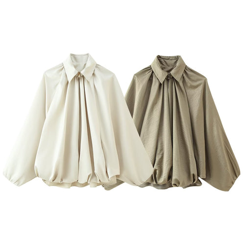Blouse élégante pour femmes avec des plis modernes et des manches volumineuses Chic & Stil
