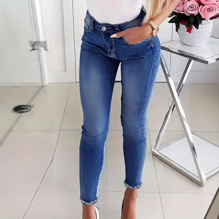Women's skinny jeans with pearl embellishments and decorative bows Amarae