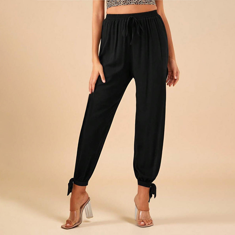 Chic & Stil Elegant women's trousers with side slits and drawstring