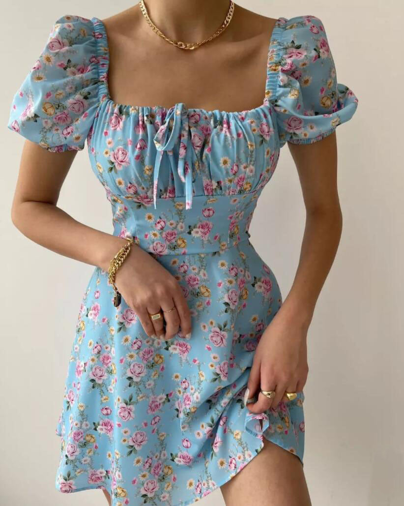 Ladies mini dress with voluminous puff sleeves and floral pattern Lune London