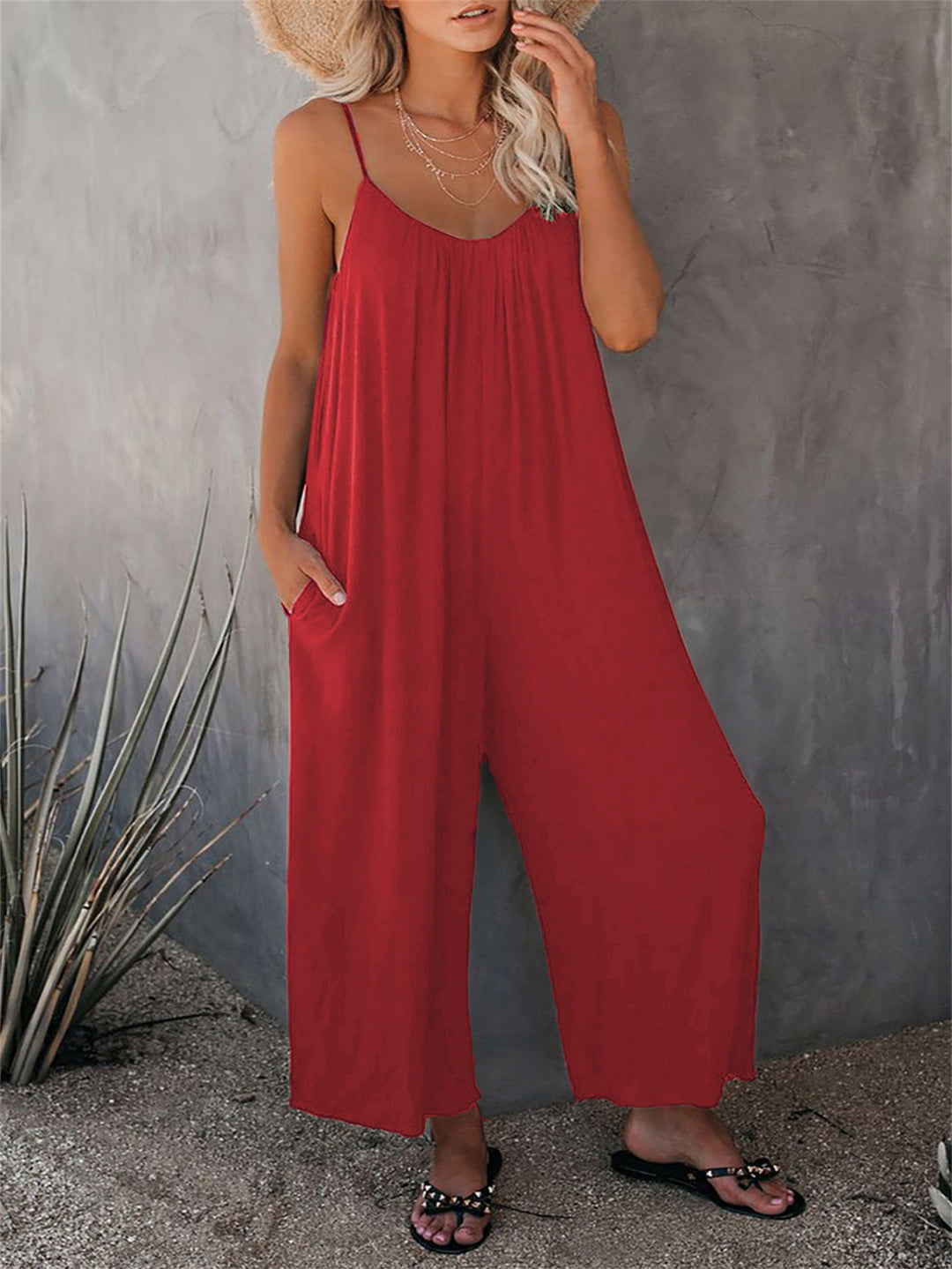 Casual summer jumpsuit for women with plunging neckline and practical pockets Lune London