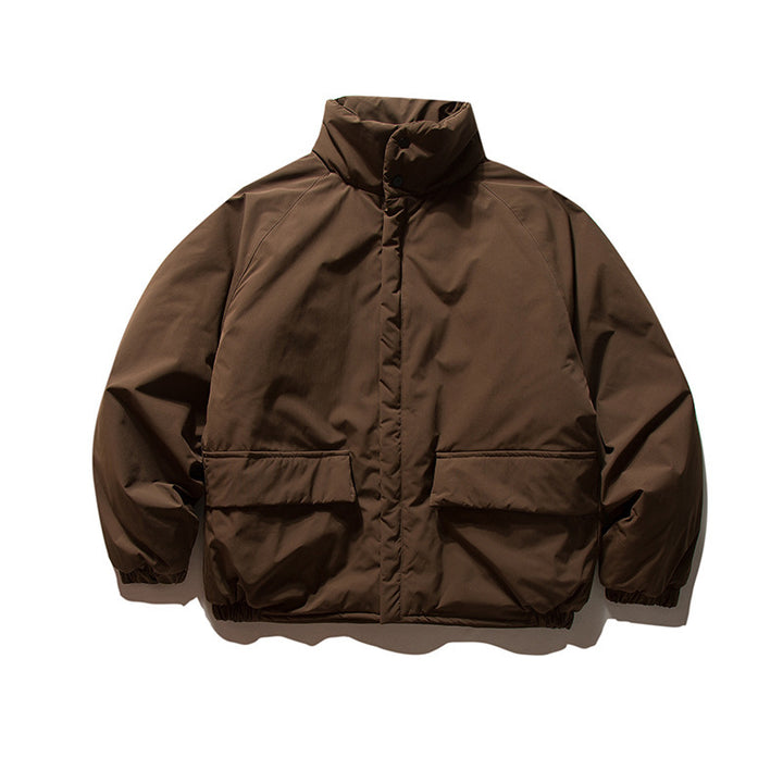 Unisex Boxy Padded Transition Jacket with High Stand-Up Collar, Elastic Cuffs and Flap Pockets Amarae