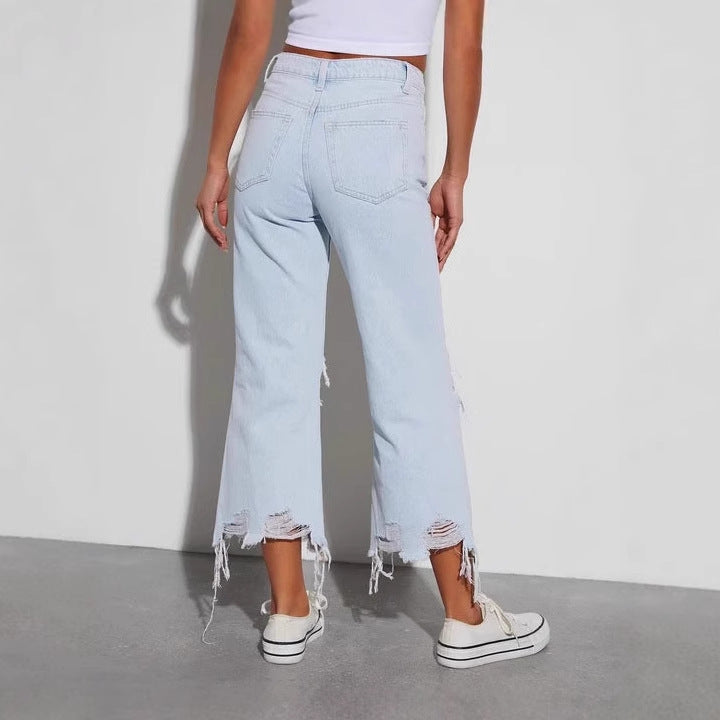 Destroyed jeans for women with a loose fit and bold rips Chic & Stil