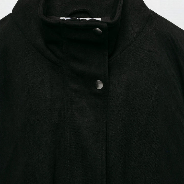 Women's tailored velvet bomber jacket with stand-up collar, shoulder epaulettes, and large flap pockets