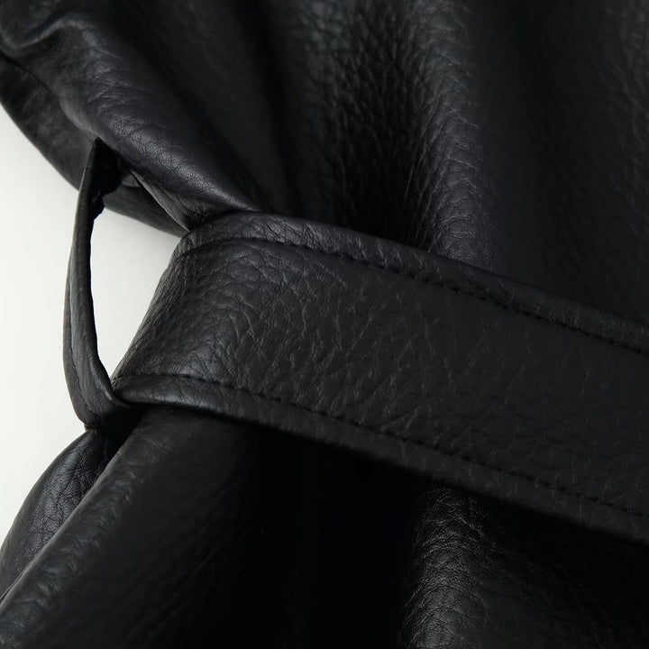 Women's short blazer made of vegan leather with shawl collar and waist tie belt Amarae