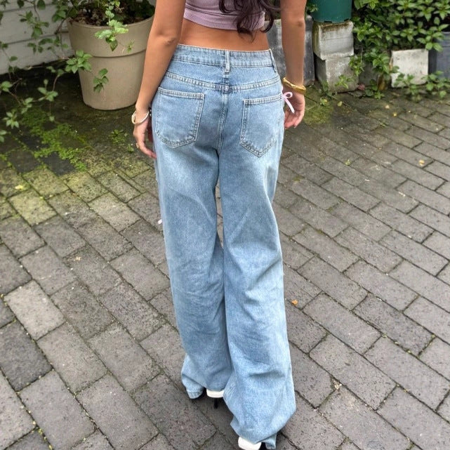 Women High-Waist Baggy Jeans with Vintage Wash, Rips and Pink Bow Applications Amarae