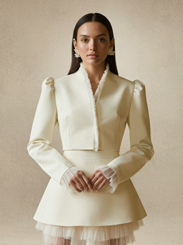 Ladies short blazer with tailored cropped silhouette, gathered shoulders and delicate tulle cuffs Amarae
