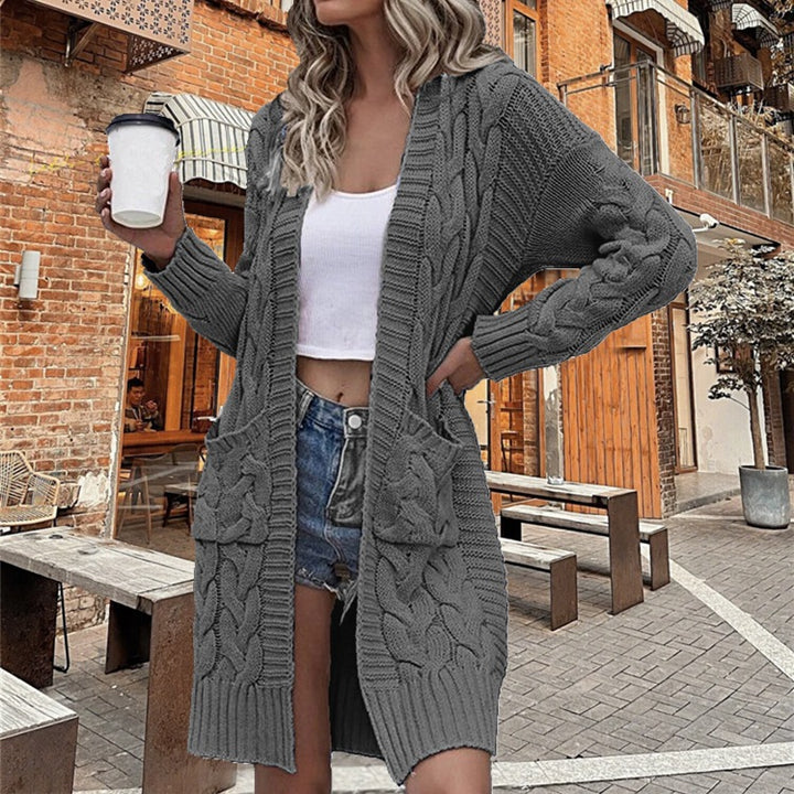 Knitted coat for women with an elegant textured pattern and practical pockets Lune London