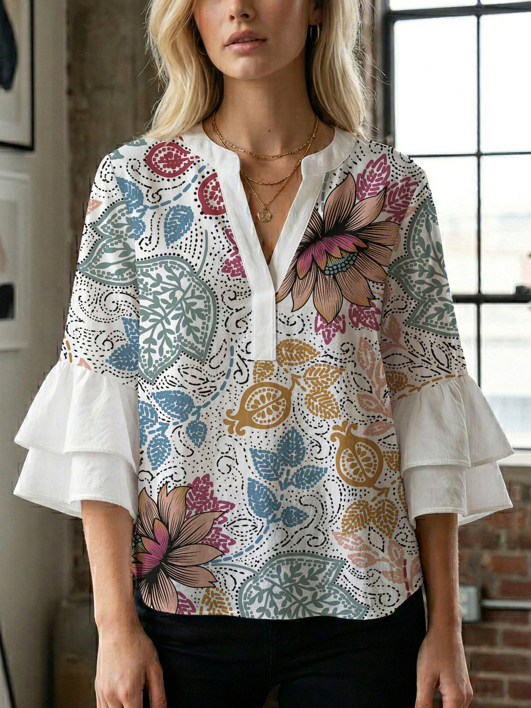 Women's blouse with voluminous ruffle sleeves and creative floral design Lune London