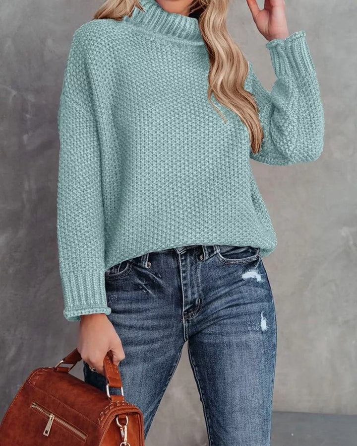 Comfortable knitted sweater for women with a high collar and airy structure Lune London
