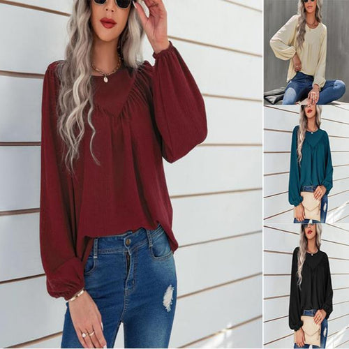 Casual blouse for women with flared sleeves and a fine ribbed texture Amarae