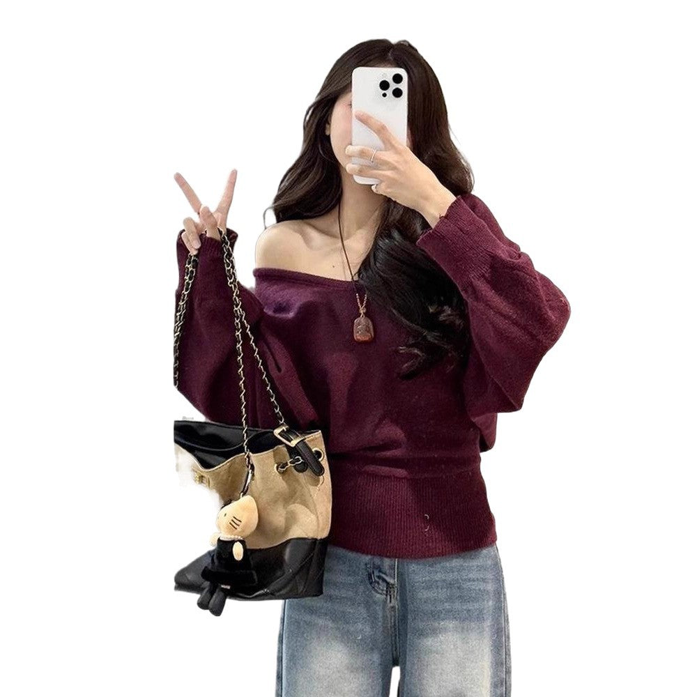Pull féminin ample avec ceinture ajustable et décolleté en V Chic & Stil