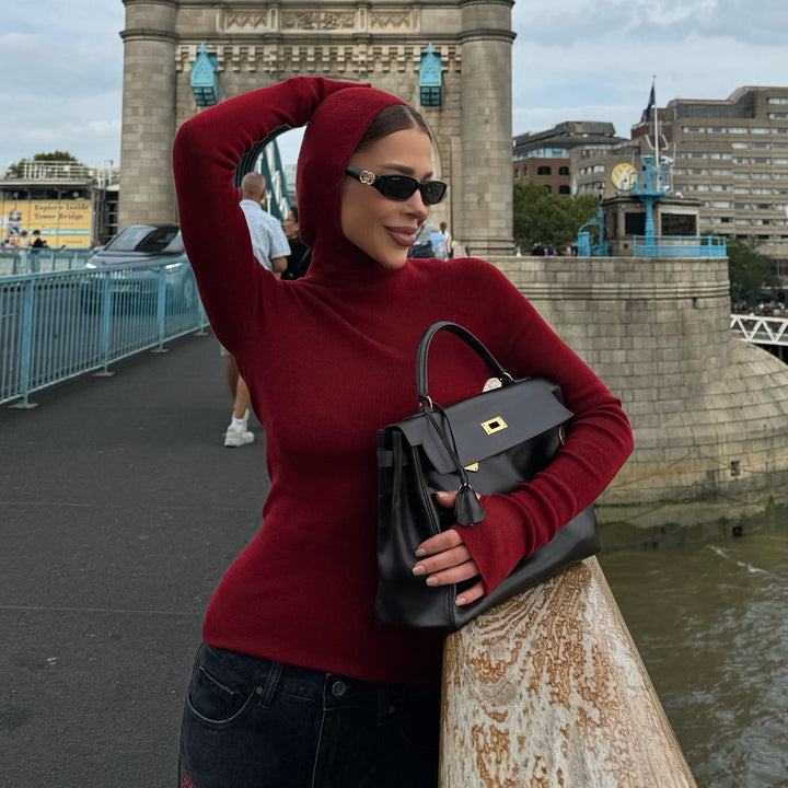 Women's fitted long sleeve top with high collar and thumb openings Lune London