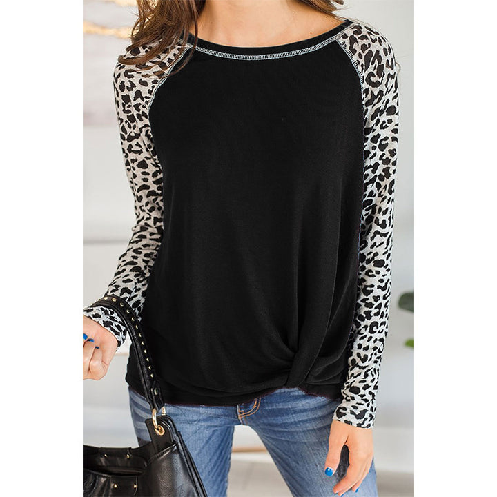 Loose blouse with long sleeves for women with leopard sleeves and bow detail Lune London