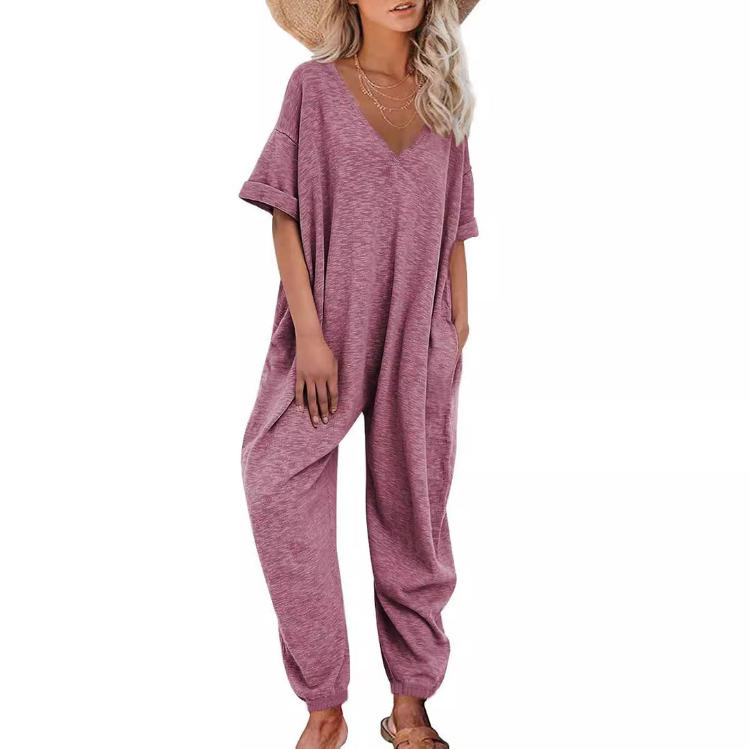 Oversized jumpsuit for women with deep V-neckline and casual pockets Lune London