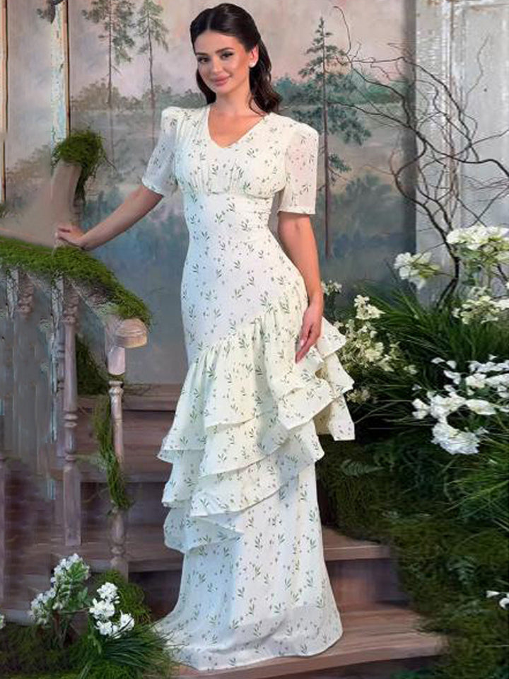 Women’s maxi dress in vintage-romantic style with asymmetric ruffles and puff sleeves Amarae