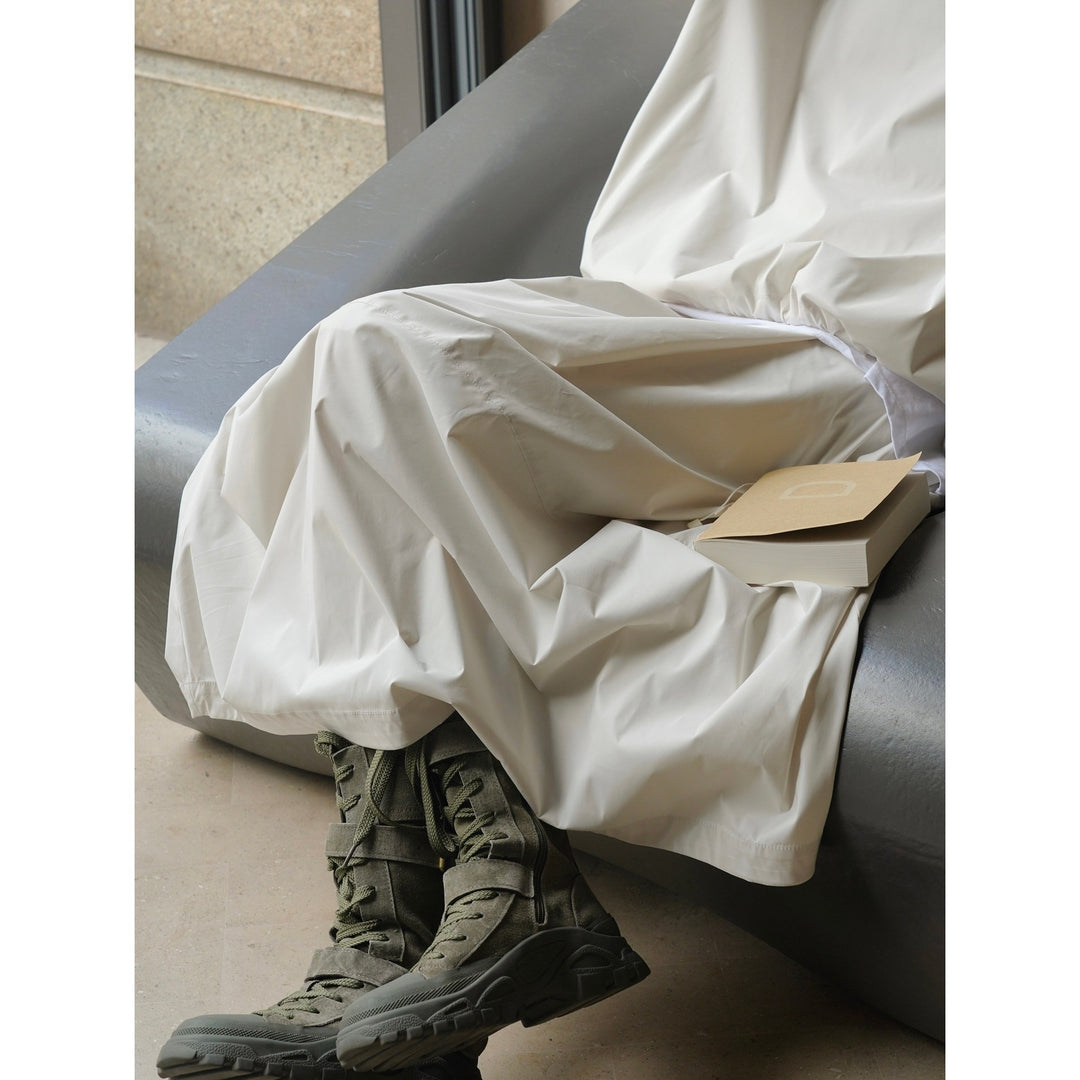 Women Longer Oversize Raincoat with concealed snap button placket and side pockets Amarae
