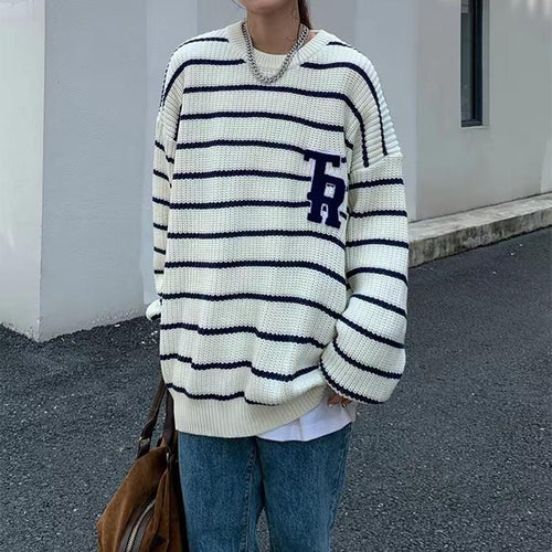 Casual oversized knit sweater for women with broken stripes and a chest pocket Amarae