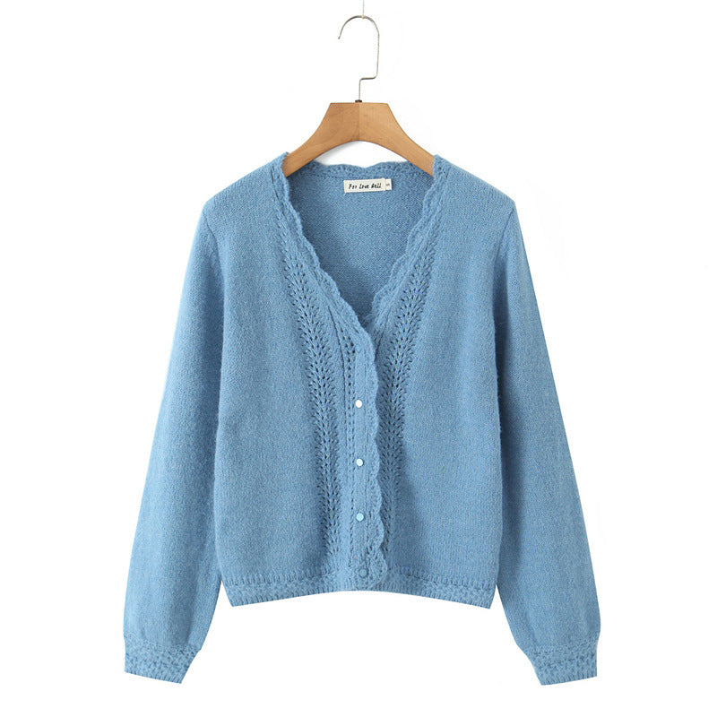 Women's knitted jacket with romantic openwork patterns and Lune London button details