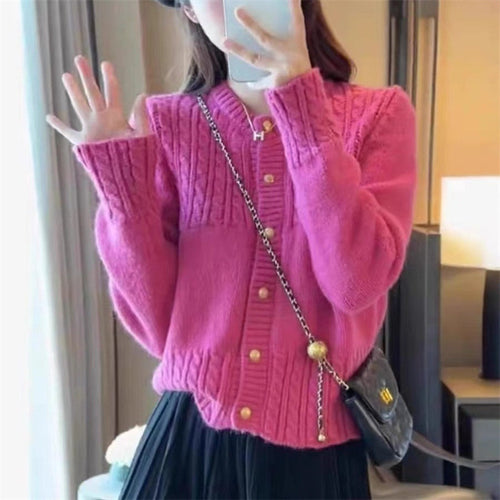 Ladies cozy knit pullover with cable texture and chic gold button details