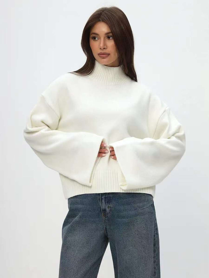 Pull en maille épaisse pour femme avec col montant et manches volumineuses Chic & Stil
