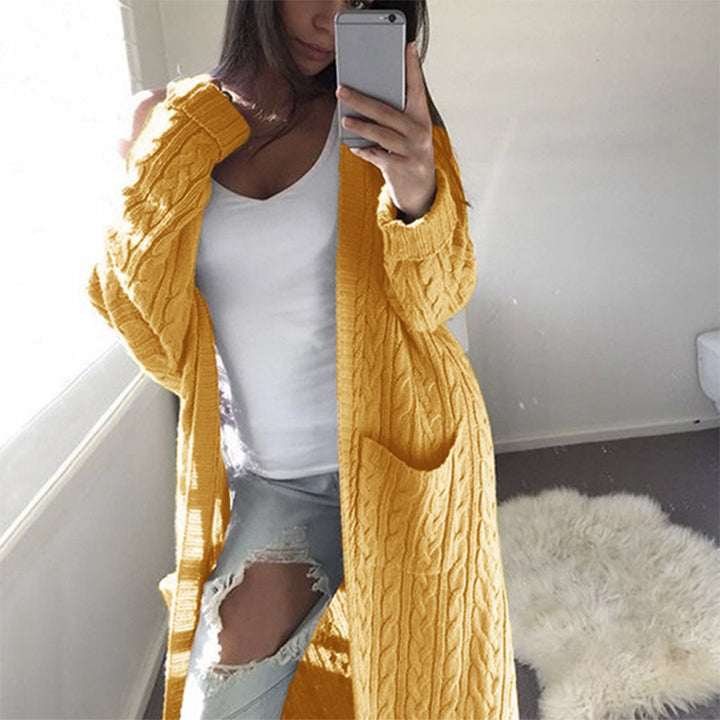 Knitted coat for women with cable pattern and practical pockets Lune London