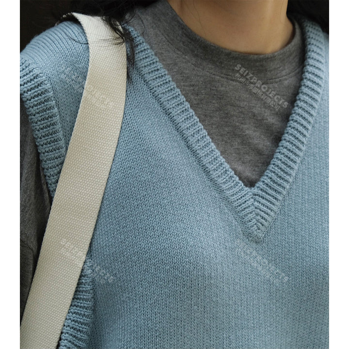 Women's sleeveless knitted vest in boxy cut with deep V-neckline and ribbed hem Amarae